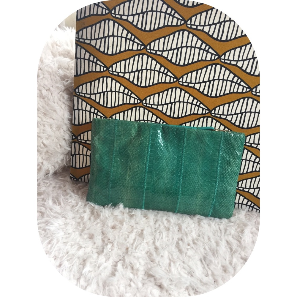 Teal snake skin like clutch